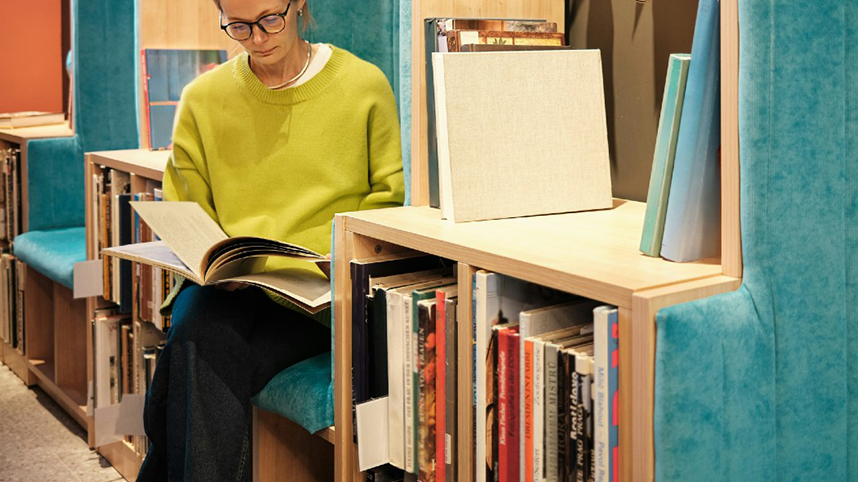 Person reading in library
